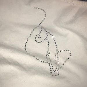 Baby phat one sleeve white top size medium  never worn great condition